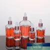 Bouteilles de parfum d'huile essentielle en verre transparent de 10 ml à 100 ml flacon compte-gouttes carré avec bouchon en or rose