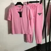 女性のプラスサイズのジャージデザイナーブランドレディースメンズ T シャツスウェットパンツデザイナーファッション Tシャツスポーツパンツ 2 パイ夏の女性のランニング