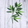 الزهور الزخرفية Lber 100pcs LifeLike Bamboo يترك نباتات خضراء مزيفة من المساحات الخضراء لزينة المكتب المنزلي