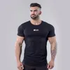 T-shirt da uomo 2023 T-shirt attillata da uomo Abbigliamento in cotone Palestre Fitness da uomo Top estivi Compressione Camiseta Masculina nera Abbigliamento rosso