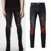 Jeans in denim nero strappato sbattimento danni candeggina lavato usurato vestibilità slim taglia 38