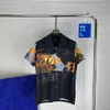 Camisas de diseñador para hombres Camisas casuales de manga corta de verano Moda Polos sueltos Estilo de playa Camisetas transpirables Camisetas Ropa # 015