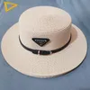 Chapeau de plage de conception de mode chapeau de pare-soleil extérieur chapeau de bassin de logo en métal tissé de paille