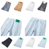 Męskie dżinsy wiosenne lato cienki Slim Fit European American High-end marka małe proste spodnie K6076