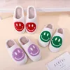 fuzzy smiley face slippers