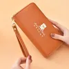 Brieftaschen Frauen lang einfaches Brieftaschen Mode Armband Cartoon Bag Doppelschicht Reißverschluss großer Kapazität Mobiltelefon Carteras