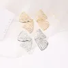 Boucles d'oreilles à la mode papillon creux pour les femmes métal couleur or/argent grande aile boucle d'oreille déclaration bijoux Oorbellen