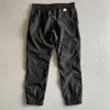 Metal nylon men pants one lens logo zipper pocket male pant outdoor tracksuit casual jogging trousers black size M-XXL CP