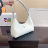 Borsa a bustina Borsa donna firmata mini pochette Manico in pelle accessori in metallo chiusura con cerniera fodera in nylon stampato