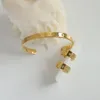 Серьги ожерелья устанавливают рисонг из нержавеющей стали C Форма восемь заостренных звезд женского браслета Открытие золота с золотым цирконом 2023