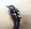 Bracelets de charme Bracelete de crânio preto elétrico Couro de aço inoxidável de 5 mm de aço inoxidável