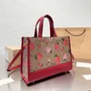 Umhängetasche Umhängetasche Designer-Taschen Handtasche Frauen Elegante Erdbeere Leder Eimertasche große Strandtaschen Damenhandtasche 2302232565