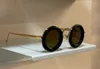 Óculos de sol dourado amarelo redondo armação grossa óculos de sol para festas masculinos femininos óculos de sol de design UV400 com caixa
