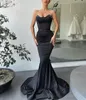 2023 Mermaid Black Evening Prom Dress ärmellose trägerloser Satin Rückenless Perlen formelle Partykleider Sexy Abendkleider Robe de Soiree