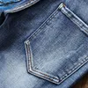 Jeans da uomo in stile europeo e americano stampati in cartone animato elasticizzati da uomo alla moda slim streetwear autunno casual pantaloni in denim blu graffiti