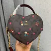 Muitos modelos em forma de coração bolsa de ombro para mulheres designer bolsa bolsa cadeia crossbody mini coração amor bolsas de couro carteira 230129