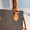 1: 1 kvalitetsdesigner mode handväska 17 cm petit sac plat lyxig axelväska m81295 med låda ml083
