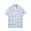 2023 männer Designer Shirts Sommer Kurzarm Casual Shirts Mode Lose Polos Strand Stil Atmungsaktive T-shirts Tees Kleidung