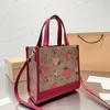 Umhängetasche Umhängetasche Designer-Taschen Handtasche Frauen Elegante Erdbeere Leder Eimertasche große Strandtaschen Damenhandtasche 2302232565