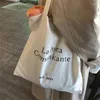 イブニングバッグコットンファブリック女性のエコショッピングバッグファッションレタープリントガールズシンキャンバスショルダーカジュアルメスの財布ハンドバッグトート