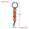 Keychains Lanyards Wooden Beaded Keychain Pendant Sports Basketball Football Baseball Tassel Bead Key Chain Keyring Drop Delivery Dhog6