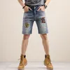 mens jeans men's blue ripped jeans rock Revival jeans men's motorcycle jeans Blue patch baggy designer blue jeans287c