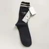 Chaussettes pour hommes Printemps Femmes Femme Version coréenne des deux barres Tube de coton rayé japonais Pile Ins Tide College Style2055