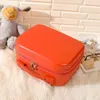 Скидка высшего качества чемоданов 14 -дюймовая мини -салона чемоданская мода Мода Женщины путешествуют багаж 230223
