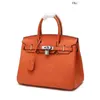 Kellyty Borse Designer BirkinBag Borse Borse Nuovo fibbia d'argento Real Bag del motivo Lychee Strato Strato Womens Messenger Portable Messenger ha FRJ