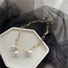 Catene Fashio Catena da collo da donna Temperamento in acciaio al titanio Conchiglia Perlina Fibbia a scatto Perla d'acqua dolce Clavicola Osso Fine Jewellery