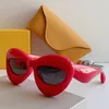 forma labbra donna sexy Occhiali da sole Hip Hop Party Shades 40097 Uomo Candy Color Cat Eye Occhiali da sole gonfiati Designer di marca di lusso Rosso nero Eyewear Ovale Acetato lucido