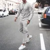 Мужские свитеры мужской спортивный костюм 2pcs sets Sportwaer jogger костюм мода мужская одежда клетчатые сплошные цвета