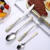 Set di stoviglie Set di coltelli da quattro pezzi in acciaio inossidabile con forchetta e cucchiaio Set da bistecca per ristorante occidentale placcato in titanio