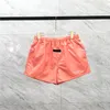 23ss verão europa praia shorts mulheres homens bordados reunidos logotipo nylon calças médias jogging calças curtas