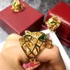 Bandringar toppkvalitet Hyperbole Green Eye Crystal Stone Vakuumpläterat guld rostfritt stål Leopardring för män kvinnor mode smycken 230224