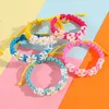 Braccialetti con ciondoli Braccialetto di fiori carino per ragazze Amicizia Bambini fatti a mano Accessori Gioielli Commercio all'ingrosso 2023 Corda di colore di tendenza