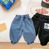 Jeans bambino bambini ragazzo autunno bambini cartone animato modello pantaloni cargo larghi pantaloni in denim vita elastica per 1 7 anni 230224