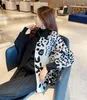 ミヤケの折りたたみバットウィングスリーブターンダウンカラーパッチワークコートを販売する女性用ジャケット