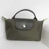 Haute qualité Magasin pas cher 90% de réduction sur la vente en gros et le sac à main version haute dame française rayé printemps été peau de vache femme mini femmes boulettes 2024 mode fourre-tout bages