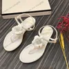 Dames sandalen 100% lederen string slipper buiten flip -flop designer bloemen glijbaan comfortabele wandel muilezels costas casual t riem jurk verstelbare enkelgespel