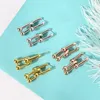 Nouveau t Gold Femmes Stud U Femmes d'oreille en forme Femmes Stud Rose Couple de bijoux en acier inoxydable Cadeaux Girls ACCESSOIRES FONCTION