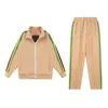 Designer Tracksuit Palms da uomo tracce da uomo femmina Angeli Sude Sweat Sweat Stripe Ribbon Ribbon Lettera Sciodo Speduto Sport Sports Abito per binario Casual Studio Studio Spazio S/M/L/XL