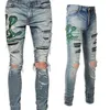 6561 Jeans Pantalones de diseñador Hombre Denim Chao Marca Distressed Amirres Serpiente Verde Bordado Agujero Parche Slim Moda Slim Pies Pequeños Blue Jeans Hombre IIGX