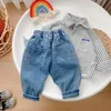 Jeans bambino bambini ragazzo autunno bambini cartone animato modello pantaloni cargo larghi pantaloni in denim vita elastica per 1 7 anni 230224