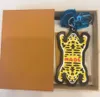 2023 Exclusive new fashion high quality men's and women's leather yellow tiger keyring