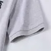 メンズカスタマイズされたゴルフポロスポロポロシャツ新しい有名なデザイナーラグジュアリーファッション印刷された刺繍文字ラペルカジュアル夏の短袖のドレス