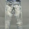 Broek merk Designer Denim Man Europese mode Amirres jeans met jeans versleten gaten patch nauwsluitende elastische beenbroek stippenverf kat snorhaar amr U8G3