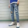 Mäns jeans mode varumärke män trasiga jeans sommar smala passform små fötter niopoint byxor koreansk version av tiggare byxor z0225