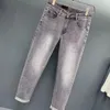 2023 mode classique jeans hommes jeans style impression à chaud trou peint mince stretch imprimé petits pieds denim