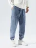 Mäns jeans vårhöst plus size baggy jeans män hip hop streetwear harem byxor mode broderi stretch bomull casual jogger jeans 8xl z0225